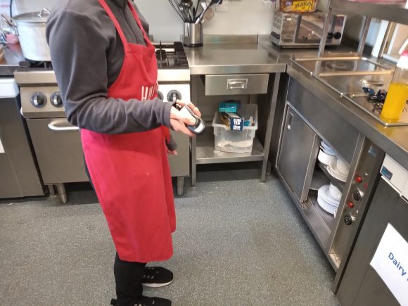 Kitchen Supervisor demonstrating alarm fob